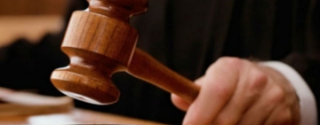 Fost șef al IPJ Prahova, trimis în judecată pentru luare de mită și trafic de influență