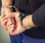 Persoană bănuită de pornografie infantilă și șantaj, reținută pentru 30 de zile